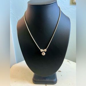 NAPIER Silver Tone Sun Pendant Necklace with side tube beads and Snake Chain 16"